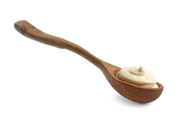 Fotobehang Natural yogurt in wooden spoon isolated on white © New Africa