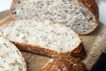 Freshly baked bread on a cutting board.