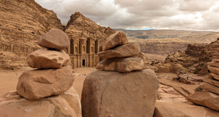 Petra treasury with rock stacks in foreground