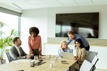 Collaborative team engaging in a creative brainstorming session office space