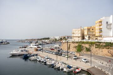 Fototapeta na wymiar Port with yachts in a sea bay in Costa Dorada, Tarragona region, Spring 2024