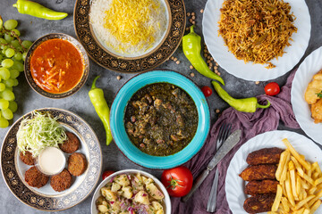 Table Full of Food: An image capturing a bountiful spread of various dishes arranged on a table, showcasing a diverse assortment of cuisines and flavors, ideal for feasts or banquets.