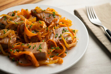 Atun encebollado. Traditional spanish tapa with premium tuna cooked with onions.