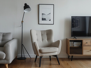 The interior of a house with an elegant armchair in the middle and a floor lamp next to it. A wall with a simple black frame decoration.
