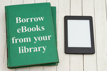 Borrow ebooks from the public library with retro old green book and ereader