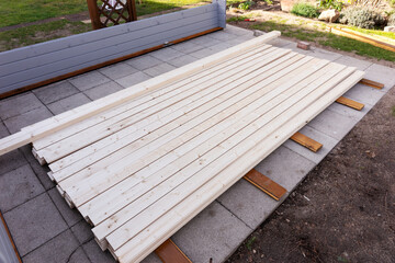 New roof boards stored on the ground