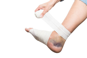 person bandaging foot, sprain, strain, inflammation, medicine