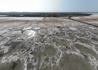 cosmic unreal landscapes of the Baskunchak salt lake on a spring day from the height of a drone...
