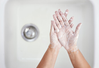 Home, washing hands and person with hygiene, foam and healthy with habit, cleaning and virus...