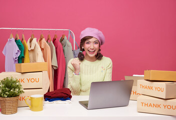 Happy Young asian woman running online store purchase shopping order and box packaging on table Startup small business SME..