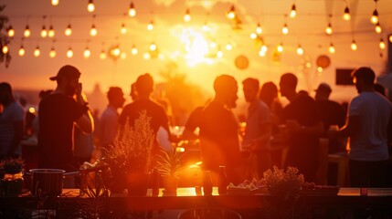 A group of people are enjoying a party at sunset.