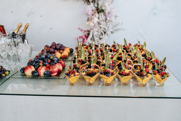 Fruits mix on a candy bar at a wedding reception.