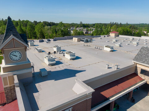 Drone Images of TPO Flat Commercial Roof With Metal Panels: New & Existing Construction 