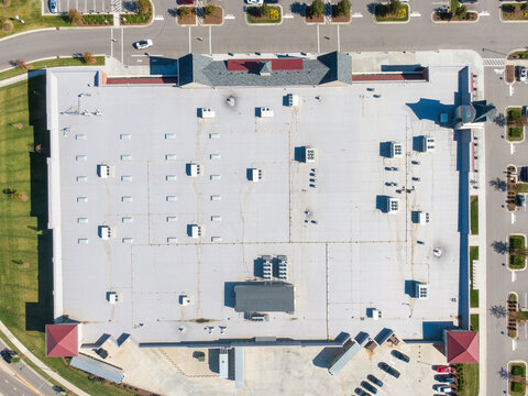 Drone Images of TPO Flat Commercial Roof With Metal Panels: New & Existing Construction 