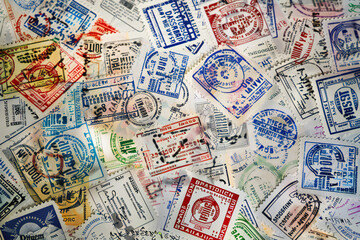 Background with various stamps in passport. Travel texture in the form of stamps in passport 