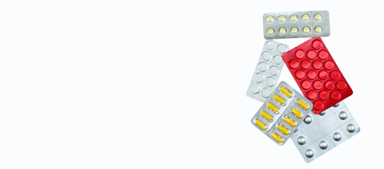 pharmaceuticals pills, tablet and capsules medicine on white background. Copy space for text. Banner.
