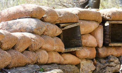 detail of the sandbags of the trench at the front of the battlefield used by the soldiers to shelter themselves - obrazy, fototapety, plakaty