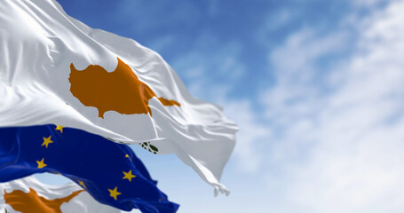 Cyprus national flag waving with the European Union flag on a clear day - 793028337