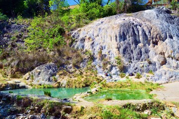Obraz premium view of the sulphurous water spa Bagni San Filippo characterized by the presence of limestone deposits in Siena, Tuscany, Italy