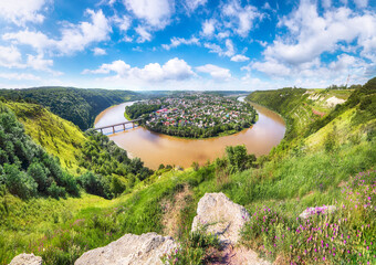 Amazing panoramic view from above to famous ukraininan city Zaleshchiki in the Dnister river canyon