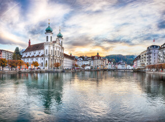 Amazing historic city center of Lucerne with famous buildings and lake Jesuitenkirche Church.