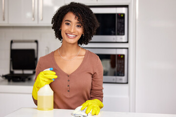 Black woman, portrait and cleaning counter in kitchen, wipe glass and spray chemicals for hygiene....