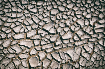 top view cracked dry ground abstract background