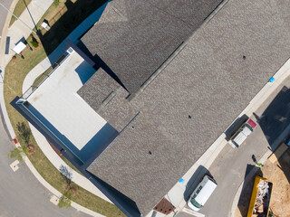 Drone Images of New Residential Apartment Buildings Featuring Architectural Asphalt Shingles On a Bright Sunny Day  