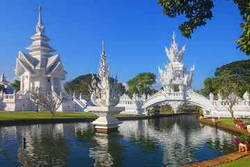 Chiang Rai, Thailand, a foreshortening of the famous Wat Rong Khun also known as White Temple - obrazy, fototapety, plakaty