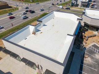 Drone Images of TPO Flat Commercial Roof With Metal Panels: New & Existing Construction 