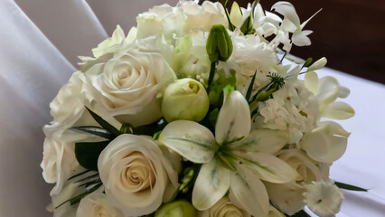 White rose flower bouquet in bundle shape for bridal in wedding ceremony
