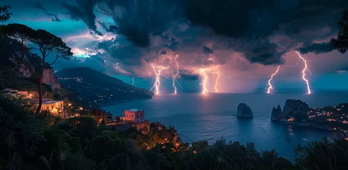 Fotobehang Vue spectaculaire d'un orage en mer vue depuis la côte de nuit © Sébastien Jouve