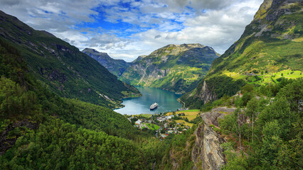 Aerial view, Cruise ships stand in the harbor of the Geiranger fjord, Norway	