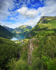 Aerial view, Cruise ships stand in the harbor of the Geiranger fjord, Norway	