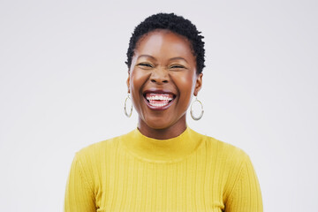 Studio, portrait and laugh for black woman, funny and confidence on white background. Face, joke...