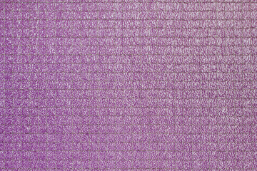 Purple safety wired glass texture. Macro shot.