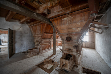 Exploration of the historic old stone mill with a spiral staircase in Southern Poland, Europe, in Winter