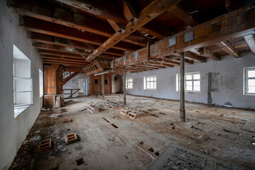 Exploration of the historic old stone mill with a spiral staircase in Southern Poland, Europe, in...