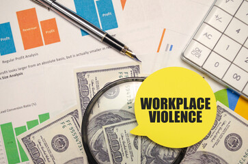 Financial documents with WORKPLACE VIOLENCE speech bubble on top of US currency and calculator