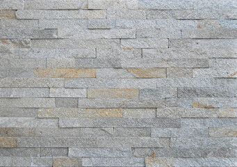 Gray stone masonry texture as background