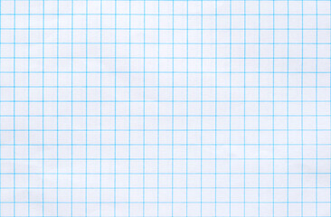 A sheet of math grid paper, graph paper texture as background