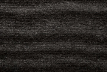 Black corrugated craft paper texture as background