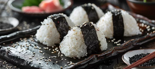 Fotobehang Delicious perfect onigiri. Japanese cuisine concept. © Oleksandr