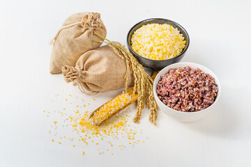 Mixed grains and mixed grain porridge on monochrome background
