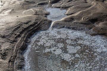 cosmic unreal landscapes of the Baskunchak salt lake on a spring day