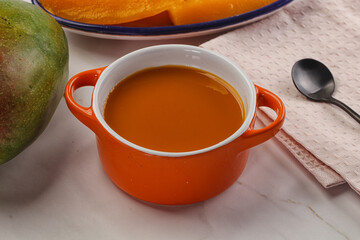 Sweet mango puree in the bowl