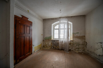 Exploration the historic old stone mill with a spiral staircase in Southern Poland, Europe, in Winter