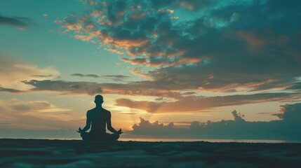 A serene scene of an individual practicing meditation at sunrise, their silhouette against the calming hues of the morning sky, embodying tranquility and mindfulness.
