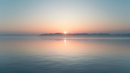 Fototapeta na wymiar Tranquil Sunrise Reflection Over Serene Lake Landscape at Dawn
