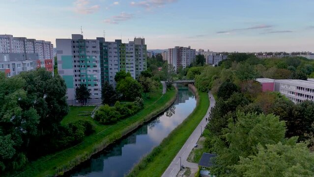 Drone captures scenic views of Petržalka's dead arm amidst city buildings. Petrzalka mrtve rameno dunaja.